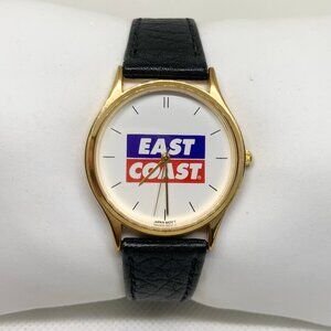 Vintage quartz analog watch gold tone 33mm round case east coast dial running